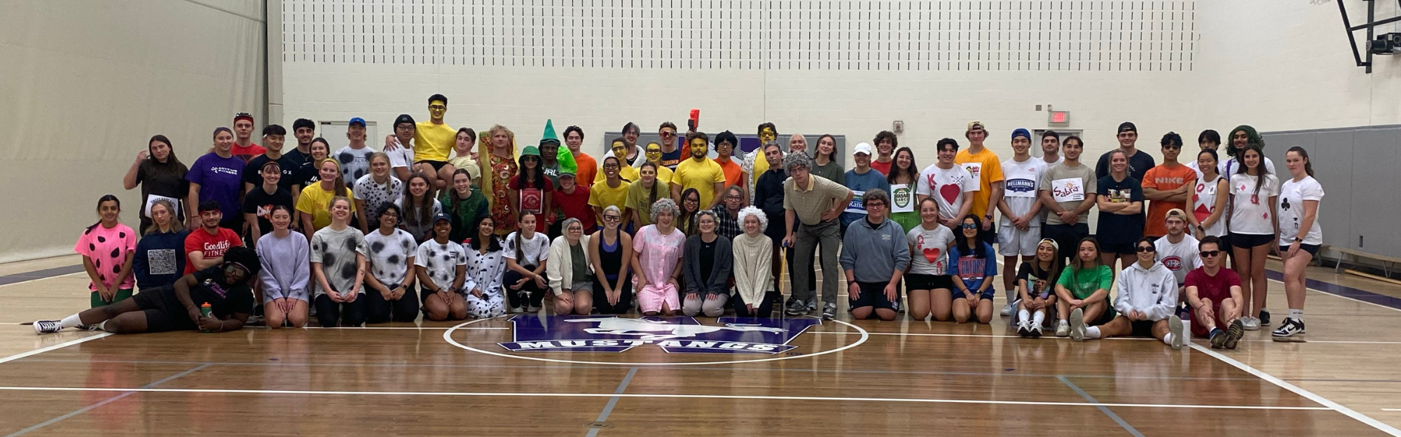 Photo of all the student staff participating in the charity tournament